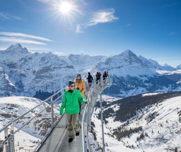 people walking on high altitude platform with views people walking on high altitude platform with views