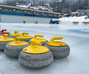 Curling equipment on the ice Curling equipment on the ice
